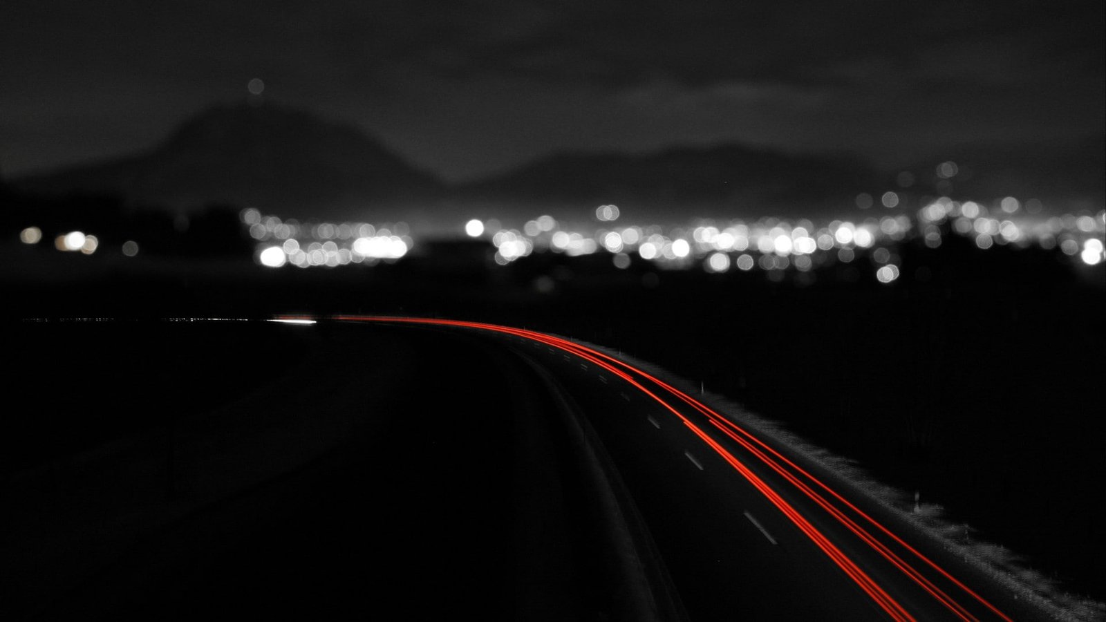 a road with red lights on it